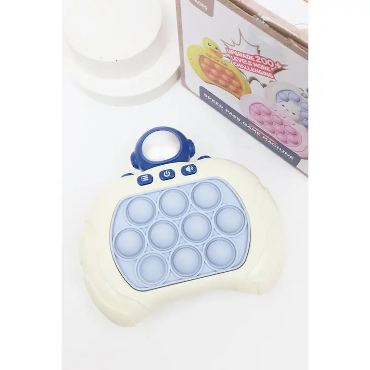 Astronaut Quick Push Light Up Pop Game - Born Childrens Boutique