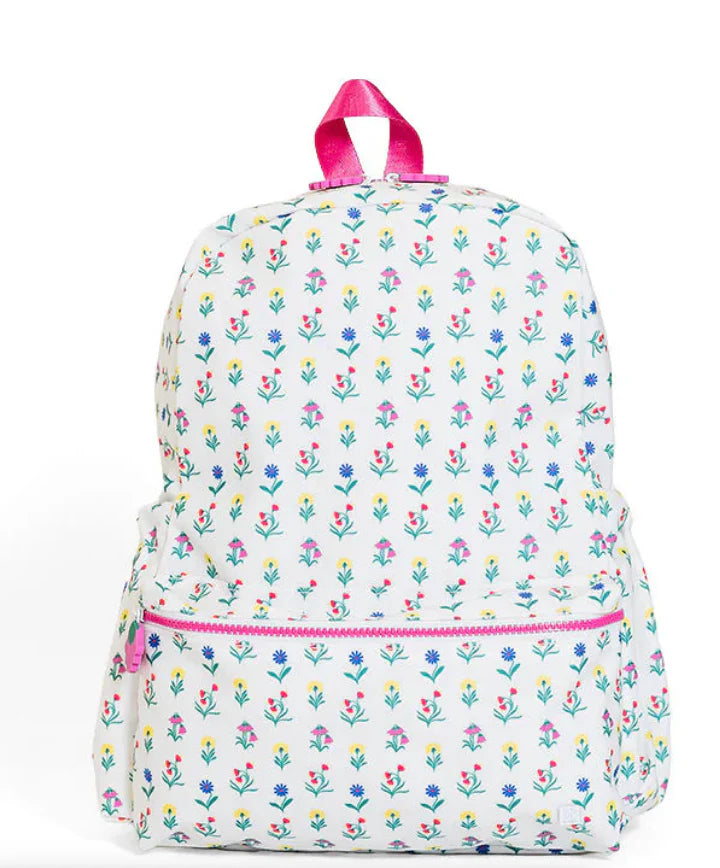 Backpack with floral pattern and pink accents on a white background