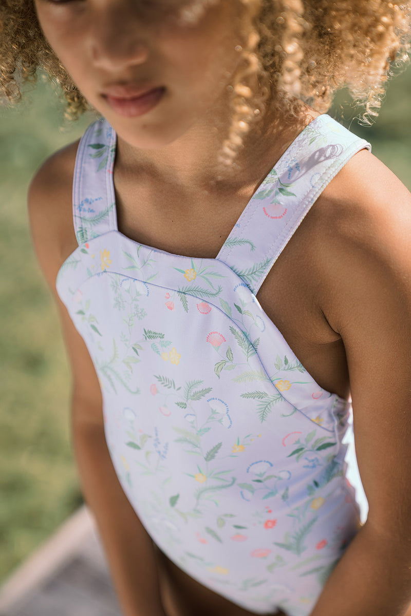 Pre-Order Bay Lavender Floral Bib One Piece with Back Bow - Born Childrens Boutique
